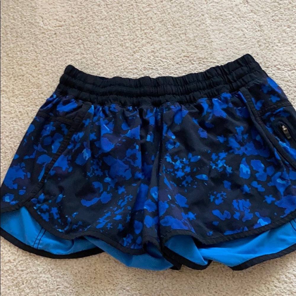 Blue and black floral lululemon tracker shorts